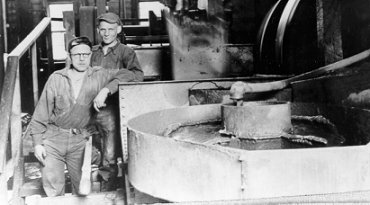 Frank Campbell and Dave Ogden in the Island Mountain Mill Machinery. The machine is a Dorr Model "F" Multizone Classifier and Marcy Ball Mill, wpH244