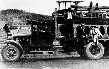 Men in front of truck, wpH46-9